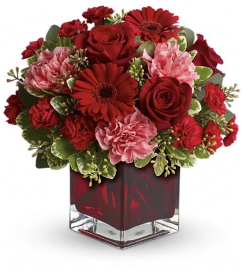Together Forever by Teleflora. An arrangement by White's Flowers.