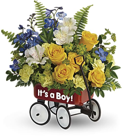 Teleflora's Sweet Little Wagon Bouquet. An arrangement by Pompano Beach Floral.