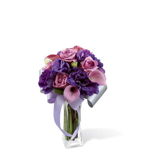 The FTD® Shades of Purple™ Bouquet. An arrangement by Country Cousins Flower Shop.