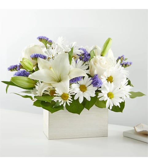 A Beyond Blue Box Bouquet. An arrangement by Country Cousins Flower Shop.
