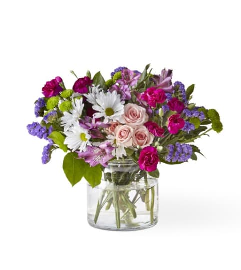 Wild Berry Bouquet by FTD. An arrangement by Country Cousins Flower Shop.