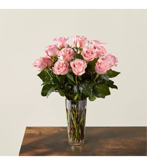 Long Stem Pink Rose Bouquet™ by FTD®. An arrangement by Country Cousins Flower Shop.