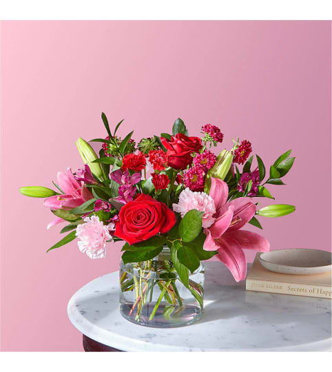 Love Spell Bouquet by FTD. An arrangement by Country Cousins Flower Shop.