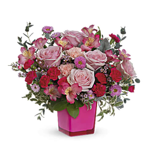 Teleflora’s Rosy Moment Bouquet. An arrangement by Jo-Dee's Blooms and Things.