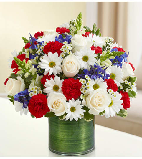 Cherished Memories - Red, White and Blue. An arrangement by Graceland Florist.
