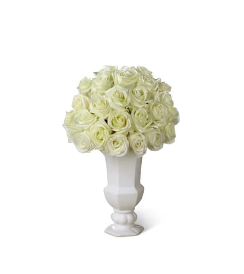 The FTD® Special Blessings™ Urn. An arrangement by Country Cousins Flower Shop.