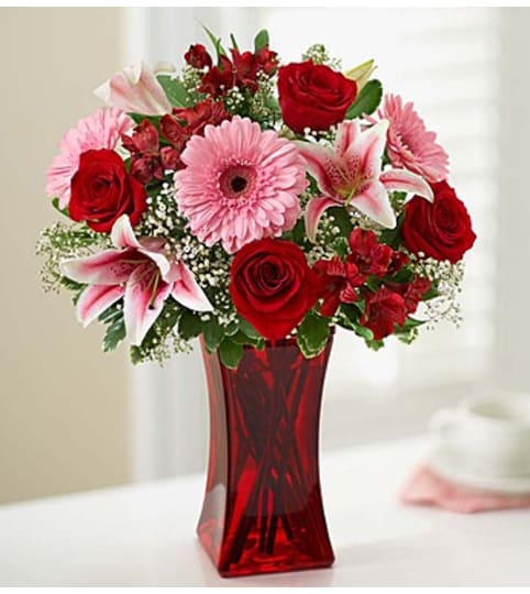 Elegant Wishes™. An arrangement by Susana's Flowers.