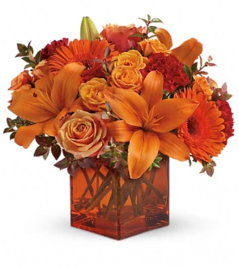 Teleflora's Sunrise Sunset. An arrangement by My Bloomin Shop.