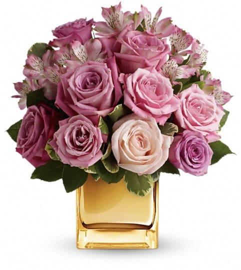 A Radiant Romance by Teleflora. An arrangement by The Village Green Florist.
