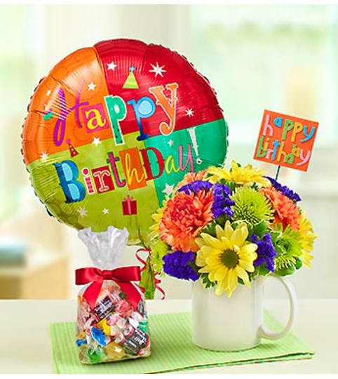 Mugable™ to Say Happy Birthday. An arrangement by Graceland Florist.