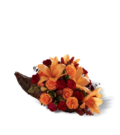 The FTD® Harvest Home™ Cornucopia. An arrangement by Country Cousins Flower Shop.