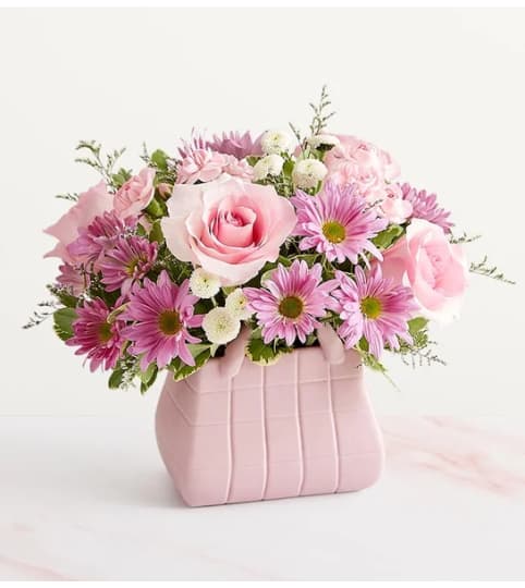 Designer Dreams™ Bouquet. An arrangement by Susana's Flowers.