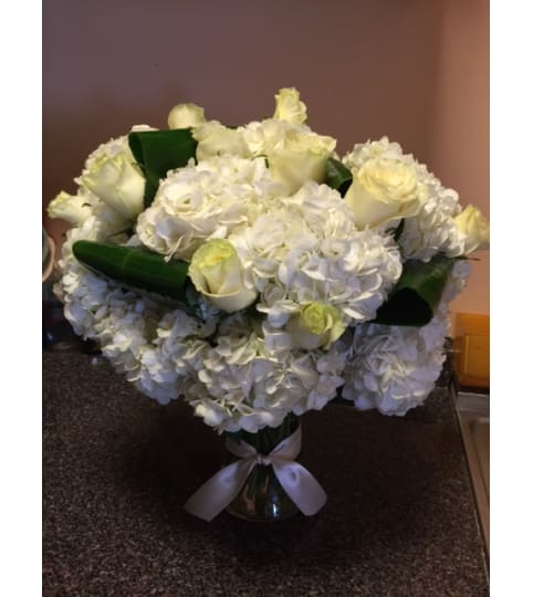 Arrangement in vase or hand tied 