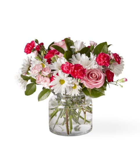 Sweet Surprises® Bouquet. An arrangement by Country Cousins Flower Shop.