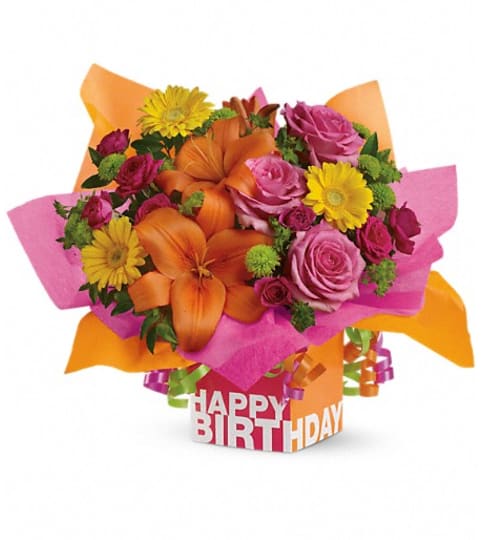 Teleflora's Rosy Birthday Present. An arrangement by Fabulous Flowers.