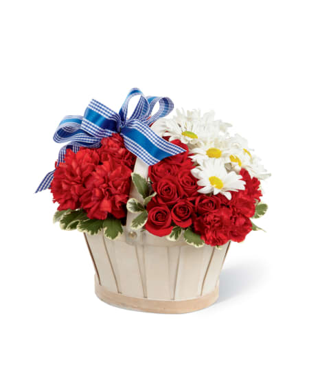 The FTD® Justice™ Basket. An arrangement by Country Cousins Flower Shop.