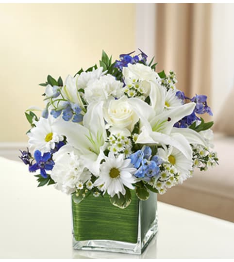 Healing Tears - Blue and White. An arrangement by Graceland Florist.