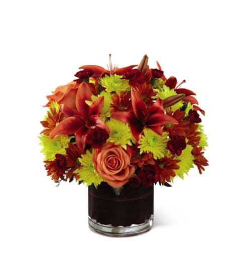 The FTD® Natural Elegance™ Bouquet with Lilies. An arrangement by Country Cousins Flower Shop.