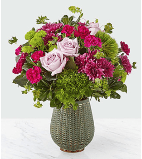 Abundance™ Bouquet. An arrangement by Country Cousins Flower Shop.