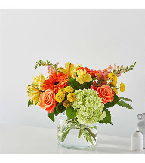 The Autumn Sunshine Bouquet. An arrangement by Country Cousins Flower Shop.