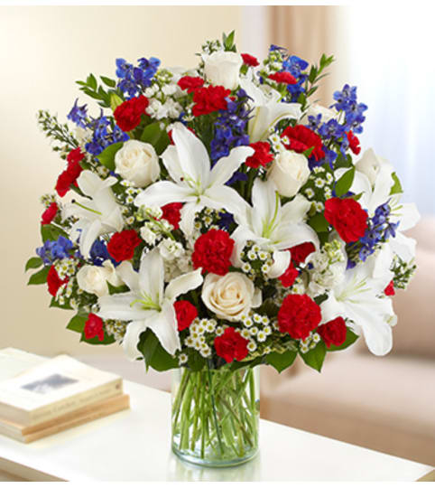 Sincerest Sorrow - Red, White and Blue. An arrangement by Graceland Florist.