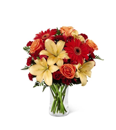 The FTD® Autumn Roads™ Bouquet with Lilies. An arrangement by Country Cousins Flower Shop.