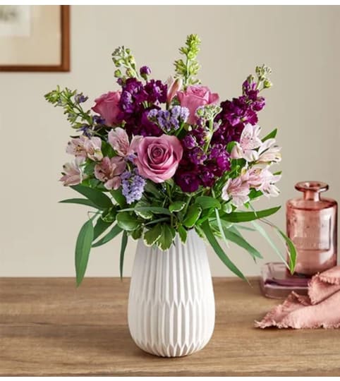 Lavender Expressions™ Bouquet. An arrangement by Flowers of Jacksonville.