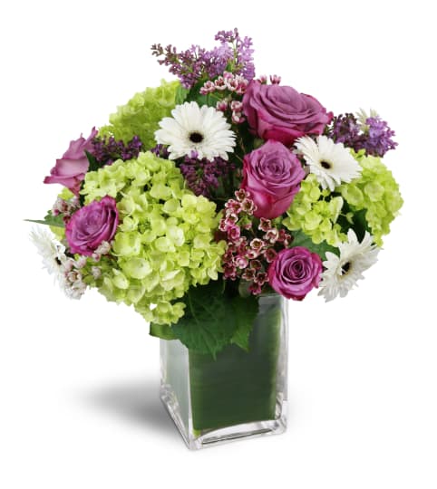 Sparking Joy™. An arrangement by Strawberry Fields Flowers and Gifts.