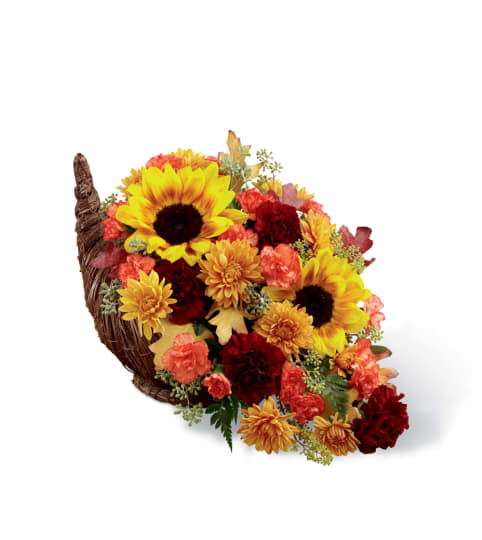 The FTD® Fall Harvest™ Cornucopia 2014. An arrangement by Country Cousins Flower Shop.