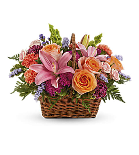 Teleflora's Blooming Joy Bouquet. An arrangement by Marivel's Florist and Gifts.