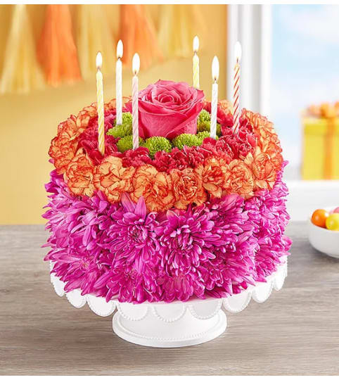 Birthday Wishes Flower Cake® Vibrant. An arrangement by Susana's Flowers.