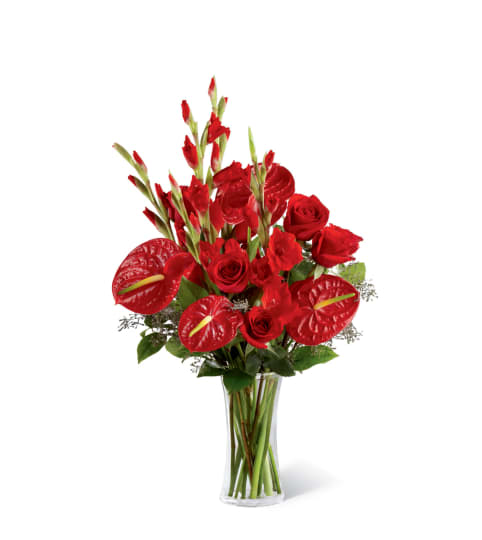 The FTD® We Fondly Remember™ Bouquet. An arrangement by Country Cousins Flower Shop.