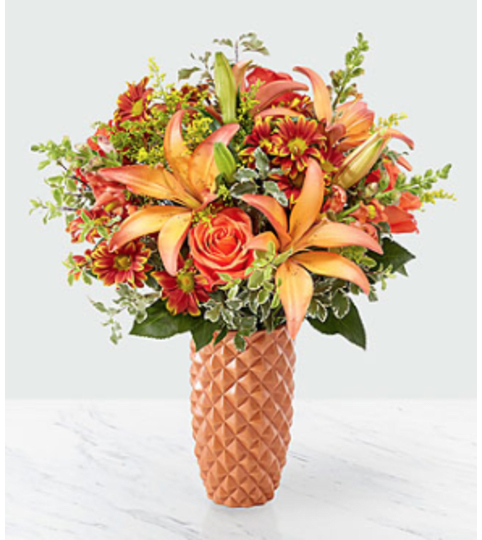 Warm Amber™ Bouquet. An arrangement by Country Cousins Flower Shop.