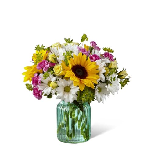 Sunlit Meadows™ Bouquet. An arrangement by Country Cousins Flower Shop.