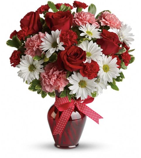 Hugs and Kisses Bouquet with Red Roses. An arrangement by Burlington Florist.