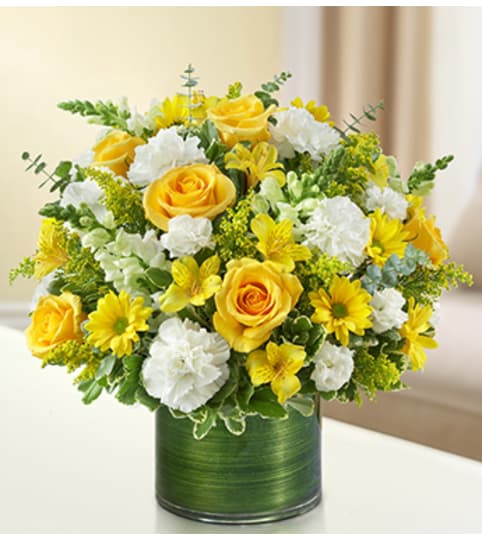 Cherished Memories - Yellow and White. An arrangement by Graceland Florist.