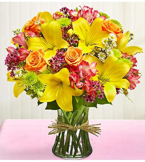 Vase Arrangement for Sympathy. An arrangement by Graceland Florist.