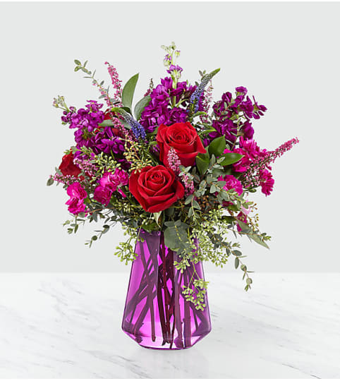 Roam Free™ Bouquet. An arrangement by Country Cousins Flower Shop.