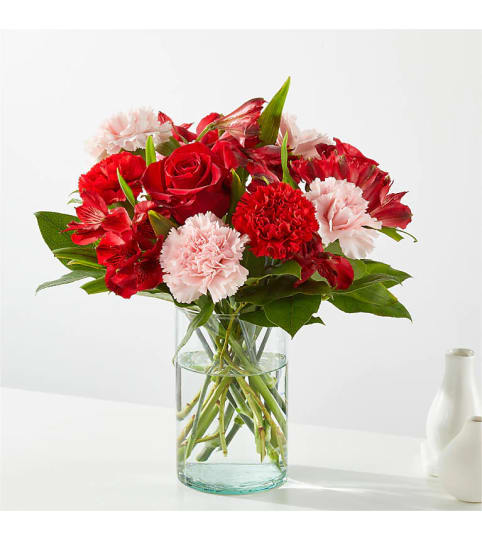 The Candy Kisses Bouquet. An arrangement by Country Cousins Flower Shop.