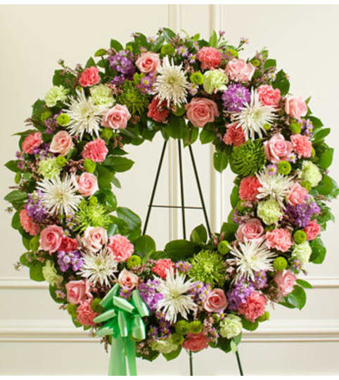 Pastel Mixed Flower Wreath. An arrangement by Graceland Florist.