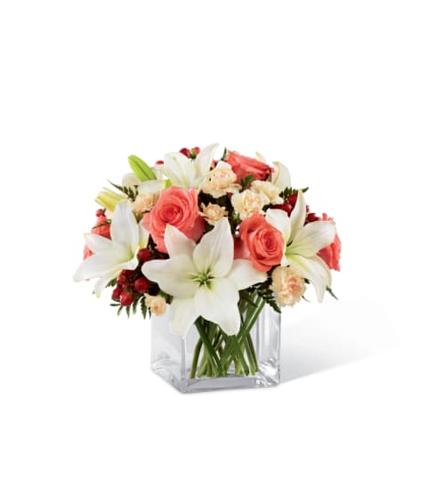 The FTD® Blushing Beauty™ Bouquet. An arrangement by Country Cousins Flower Shop.