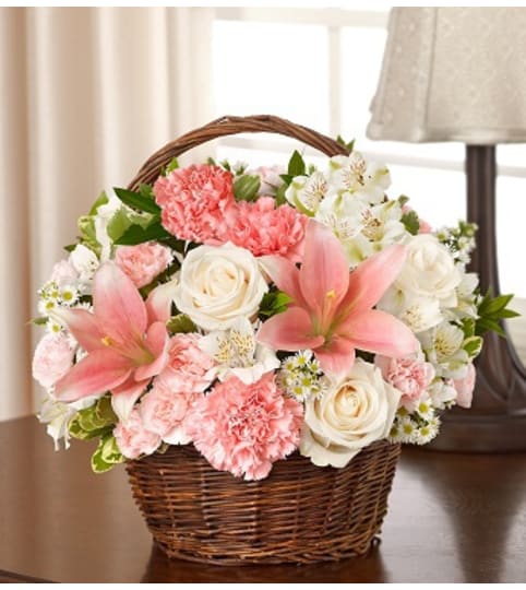 Peace, Prayers and Blessings - Pink and White. An arrangement by Graceland Florist.
