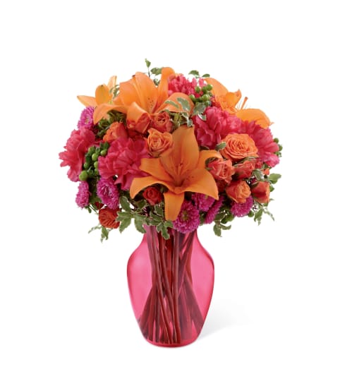 The FTD® All Is Bright™ Bouquet. An arrangement by Country Cousins Flower Shop.