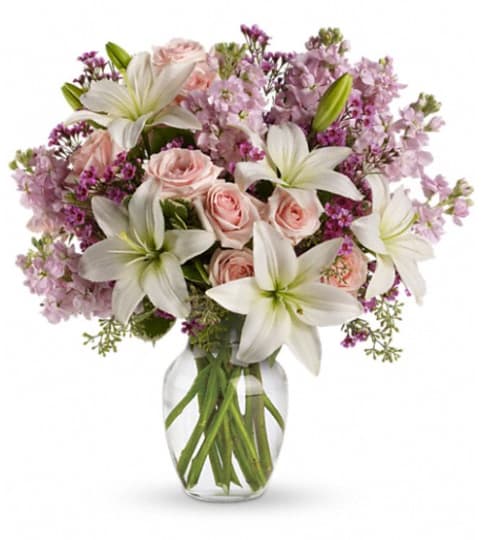 Teleflora's Blossoming Romance. An arrangement by Flowers and Pine World.