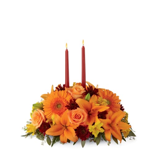 The FTD® Bright Autumn™ Centerpiece. An arrangement by Country Cousins Flower Shop.