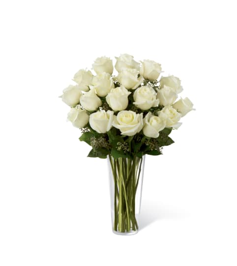 The FTD® White Rose Bouquet. An arrangement by Country Cousins Flower Shop.