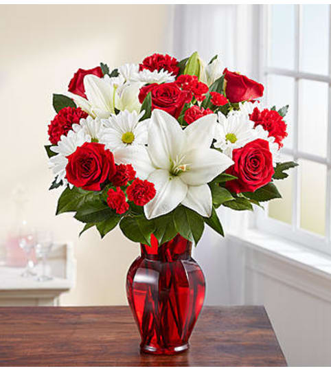 Red and White Delight™. An arrangement by Susana's Flowers.