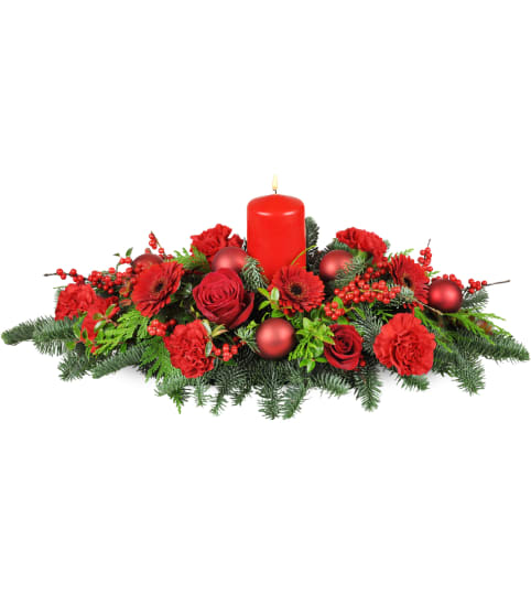 With All the Trimmings™ Centerpiece. An arrangement by Rocio Flower Shop.