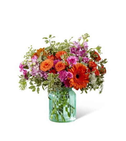 The FTD® Aqua Escape™ Bouquet by Better Homes and Gardens®. An arrangement by Country Cousins Flower Shop.