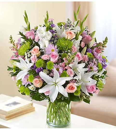 Sincerest Sorrow - Multicolor Pastel. An arrangement by Graceland Florist.